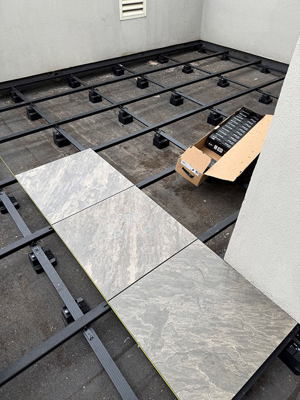 installation of tiles on concrete using Qwickbuild