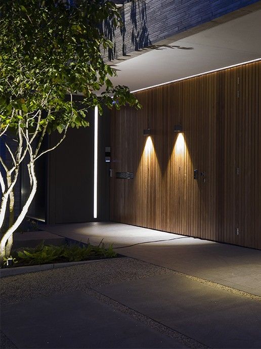 Ace Down 100-230 V light lit above wall hangings