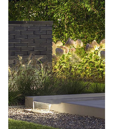 In-Lite Evo Hyde used to illuminate waterfall and garden