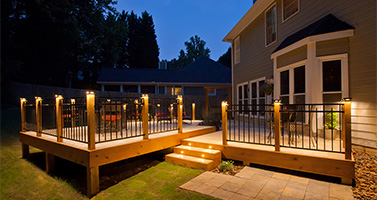 Fortress Lighting, back deck at night with lit posts