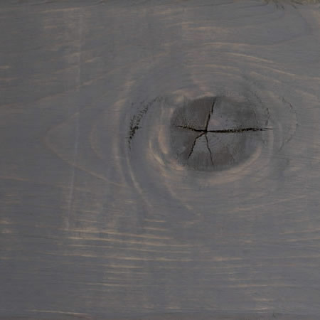 blue slate finish cutek sample on brown pressure treated lumber