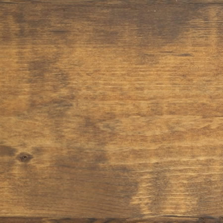 cedartone finish cutek sample on brown pressure treated lumber
