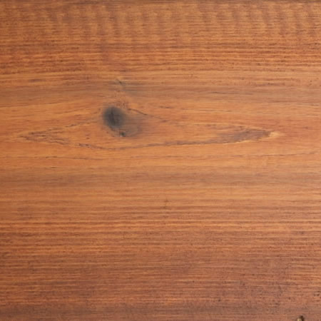 burnt red finish cutek sample on knotty Western Red Cedar