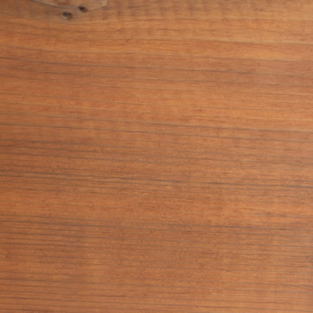 burnt red finish cutek sample on knotty Western Red Cedar